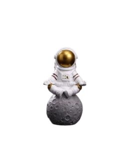 figurine astronaute meditation