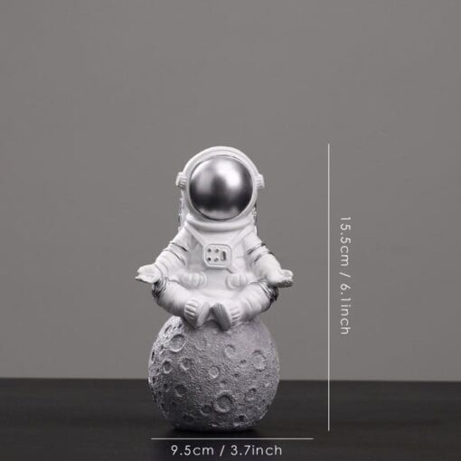 figurine astronaute meditation argent