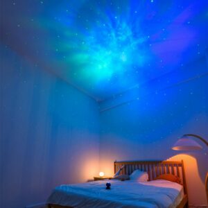 galaxie bleu foncé projecteur astronaute